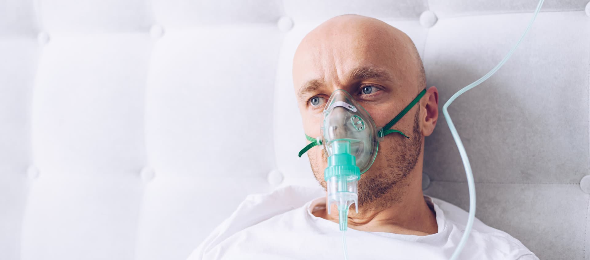 adult man using oxygen ventilator